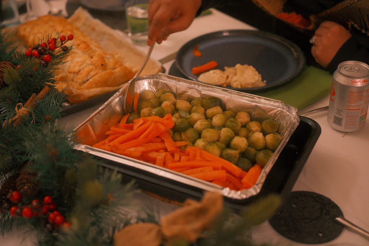Roast carrots and Brussels sprouts on a table
